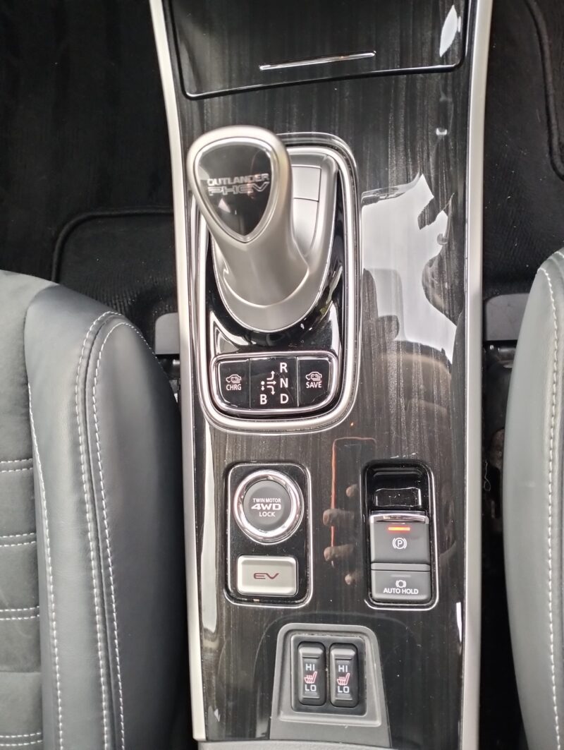 MITSUBISHI OUTLANDER PHEV { HYBRID & ELECTRIC }